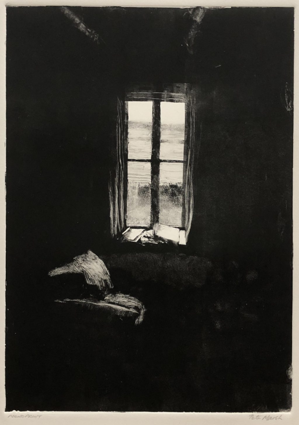 Absent Friend. empty armchair overlooking loch