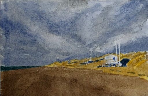 Late afternoon sun shining on the life-guard hut at Formby Beach